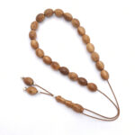 Coconut wood kompoloi with silver fittings