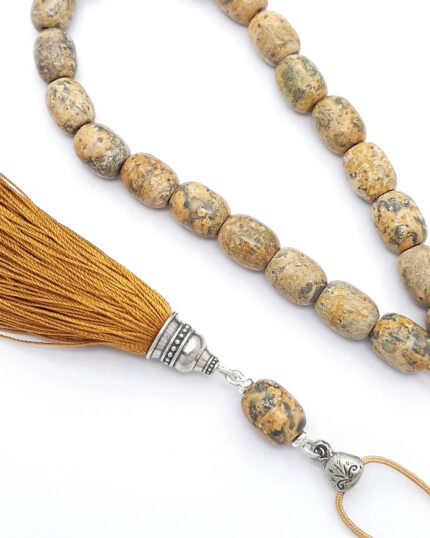 Leopards skin kompoloi with silk tassel and silver fittings