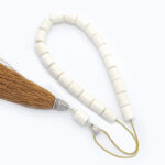 Camel bone kompoloi with silk tassel and silver fittings