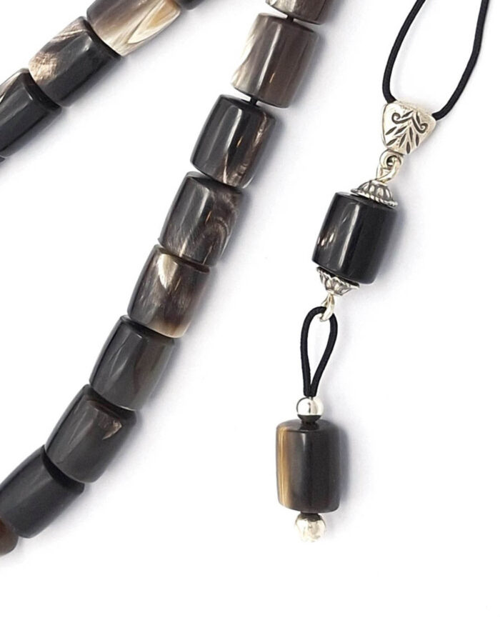 Animal horn kompoloi with silver fittings