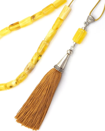 Yellow matt amber kompoloi with silver fittings and silk
