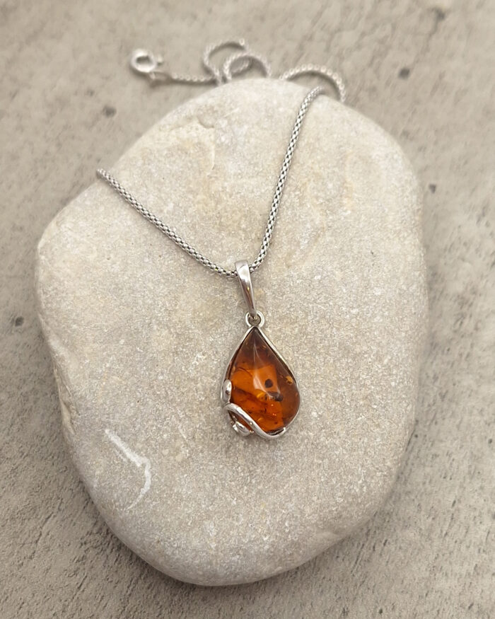 Handmade Baltic Amber Pendant in cognac color with inclusions