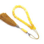 Yellow matt amber kompoloi with silver fittings and silk