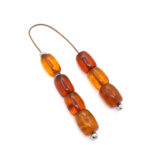 Begleri made of genuine Baltic amber in cognac color and 925 silver