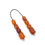 Begleri made of genuine Baltic amber in cognac color and 925 silver