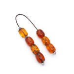 Begleri made of genuine Baltic amber in cognac color and 925 silver